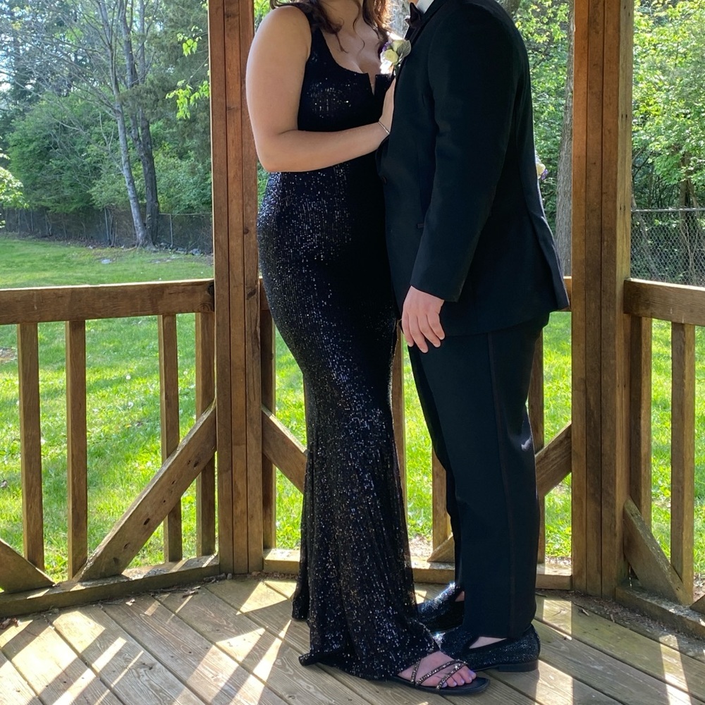 Black sequined dress.